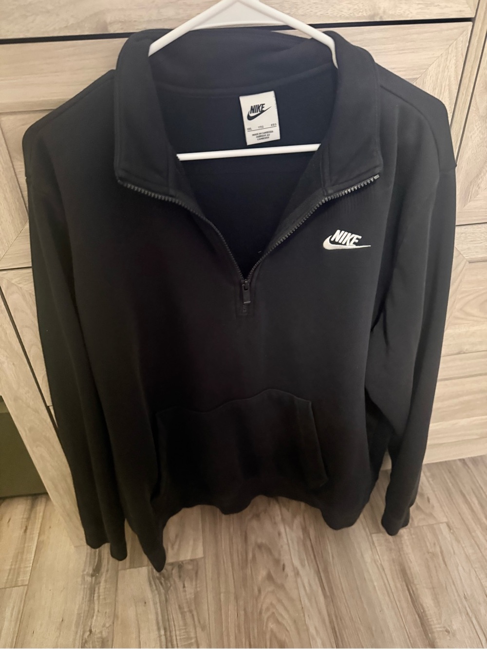 Women’s Black Half-Zip Pullover with White Swoosh